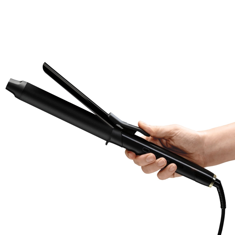 Babyliss PRO lokówka Curling TONG 32 mm trzymana w dłoni podczas stylizacji